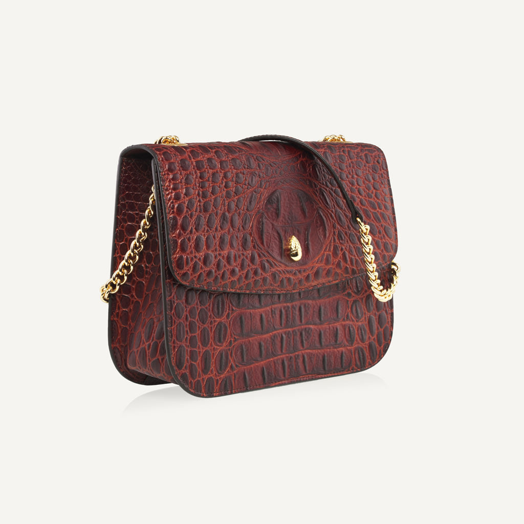 side-view-of-grand-dauphin-brown-croc-embossed-leather-bag-with-structured-silhouette-and-gold-chain