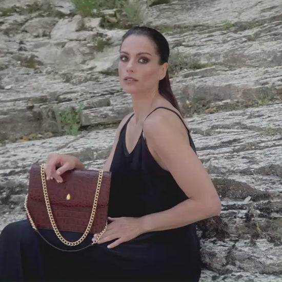 luxury-grand-dauphin-brown-croc-embossed-leather-bag-video-showcasing-design-and-gold-chain